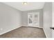 Cozy bedroom with double doors leading to the backyard at 4809 Mountain Valley Rd, Las Vegas, NV 89121