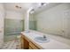 Bathroom with a double sink vanity and shower-tub combination at 4911 W Pebble Rd, Las Vegas, NV 89139