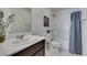 Bathroom showcasing a vanity with a sink, toilet and tub with shower combo at 5382 El Nevero St, Las Vegas, NV 89166