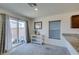 Bright dining area featuring sliding glass doors and a granite countertop at 5382 El Nevero St, Las Vegas, NV 89166