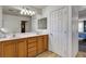 Spacious bathroom featuring a double sink vanity and walk-in closet access at 5827 Delonee Skies Ave, Las Vegas, NV 89131