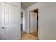 Hallway with closet and tile flooring leading to the rest of the home at 5827 Delonee Skies Ave, Las Vegas, NV 89131