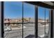 Window view of neighborhood street with a scenic mountain backdrop at 5827 Delonee Skies Ave, Las Vegas, NV 89131