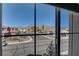 Window view of the neighborhood and mountains in the distance at 5827 Delonee Skies Ave, Las Vegas, NV 89131