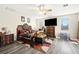 Bedroom features a large bed, TV, and a decorative area rug at 5832 Ivy Vine Ct, Las Vegas, NV 89141