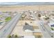 Sweeping aerial view of the property, highlighting the newly constructed home and surrounding neighborhood in a desert landscape at 6360 Montclair St, Pahrump, NV 89061