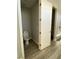 Conveniently located half-bathroom with white toilet, adjacent to the shower at 6360 Montclair St, Pahrump, NV 89061