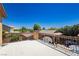 Home's deck area, showcasing railing and neighborhood views under a bright, cloudless sky at 6391 Tempting Choice Ave, Las Vegas, NV 89131