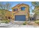 Charming two-story home with landscaped yard and a two-car garage in a residential neighborhood at 6629 Breakwater Reef St, Las Vegas, NV 89149