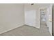 Neutral bedroom with plush carpet, ample closet space, and bright natural light at 6959 Emerald Springs Ln, Las Vegas, NV 89113