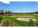 Scenic view of the lush golf course and pond at 6959 Emerald Springs Ln, Las Vegas, NV 89113