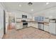 Bright kitchen featuring stainless steel appliances and plenty of cabinet space at 6959 Emerald Springs Ln, Las Vegas, NV 89113