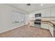 Bright kitchen with stainless steel appliances and tile flooring at 6959 Emerald Springs Ln, Las Vegas, NV 89113