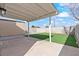 A covered patio offers shade and a spot to relax in the private backyard at 7020 English Mist Cir, Las Vegas, NV 89128