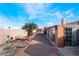 Outdoor living in a backyard space featuring patio and desert landscaping at 706 Morrocco Dr, Henderson, NV 89002