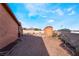 A low maintenance backyard shows an outdoor shed at 706 Morrocco Dr, Henderson, NV 89002