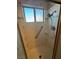 Walk in shower featuring a shower head and shelves at 706 Morrocco Dr, Henderson, NV 89002