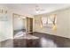 Bright bedroom featuring hard wood floors, a closet, and a large window for natural light at 706 Morrocco Dr, Henderson, NV 89002