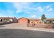 Charming single-story home featuring a well-maintained front yard and a spacious driveway at 706 Morrocco Dr, Henderson, NV 89002