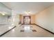 Spacious living room featuring a fireplace, tile flooring, and large windows at 706 Morrocco Dr, Henderson, NV 89002