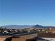 This view highlights mountains and neighborhood at 706 Morrocco Dr, Henderson, NV 89002