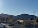 Neighborhood view shows a mountain, park and clear blue sky at 706 Morrocco Dr, Henderson, NV 89002