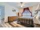 Spacious bedroom featuring a ceiling fan, modern flooring, and natural light at 7632 Amato Ave, Las Vegas, NV 89128