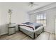 Bedroom with a window and small refrigerator at 7632 Amato Ave, Las Vegas, NV 89128