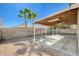 Backyard patio with roof, designed for comfortable outdoor lounging, complemented by low-maintenance landscaping at 7719 Selby Ct, Las Vegas, NV 89147