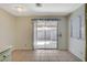 View of dining area with sliding glass door access to the fenced in backyard at 7719 Selby Ct, Las Vegas, NV 89147