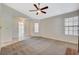 Comfortable living room with carpet and a glimpse of the entry area at 7719 Selby Ct, Las Vegas, NV 89147