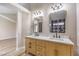 Stylish bathroom featuring dual sinks, modern fixtures, and elegant finishes at 8745 Point Kathy Cir, Las Vegas, NV 89147