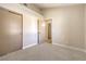 Bedroom featuring neutral carpet and a closet with sliding doors at 8745 Point Kathy Cir, Las Vegas, NV 89147