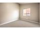 Bedroom featuring neutral carpet and a window providing natural light at 8745 Point Kathy Cir, Las Vegas, NV 89147