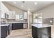 Well-lit kitchen equipped with stainless steel appliances and sleek countertops at 8745 Point Kathy Cir, Las Vegas, NV 89147