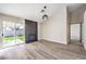 Cozy living room boasting a modern fireplace and sliding glass doors at 8745 Point Kathy Cir, Las Vegas, NV 89147