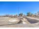 Concrete skate park bowl, perfect for skaters to enjoy and practice their skills in a safe environment at 8745 Point Kathy Cir, Las Vegas, NV 89147