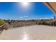 Wide open balcony with tile flooring and open sky above showcasing views of the community at 9631 Orient Express Ct, Las Vegas, NV 89145