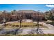 Elegant home featuring a circular driveway, manicured lawn, and a stately front entrance at 9631 Orient Express Ct, Las Vegas, NV 89145