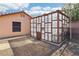 Backyard view of a greenhouse with ample natural light at 1011 Amber Gate St, Henderson, NV 89002