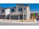 Charming two-story home featuring a modern design, a two-car garage, and a brick driveway at 10246 Bloom Quick Ct, Las Vegas, NV 89141
