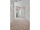 Spacious living room featuring carpeted floors, light gray walls, and an open floor plan at 10246 Bloom Quick Ct, Las Vegas, NV 89141