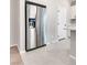 Close-up view of a modern stainless steel refrigerator with water and ice dispenser at 10246 Bloom Quick Ct, Las Vegas, NV 89141