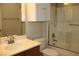 Well-lit bathroom featuring a shower-tub combo and modern fixtures at 10321 Birch Bluff Ln, Las Vegas, NV 89145
