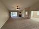 Living room with a ceiling fan and fireplace, offering lots of space at 10321 Birch Bluff Ln, Las Vegas, NV 89145