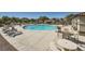 Relaxing community pool with comfortable seating and a shaded pergola, perfect for outdoor enjoyment at 10332 Sweet Laurel St, Las Vegas, NV 89178
