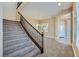 Grand staircase and entry with natural lighting at 10332 Sweet Laurel St, Las Vegas, NV 89178