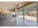 Open garage featuring epoxy flooring and space for storage at 10332 Sweet Laurel St, Las Vegas, NV 89178