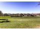 Mountain's Edge community featuring large grassy area, desert landscaping, and walking trails at 10332 Sweet Laurel St, Las Vegas, NV 89178