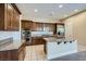 Spacious kitchen with granite countertops, stainless steel appliances, and ample cabinet space at 10332 Sweet Laurel St, Las Vegas, NV 89178